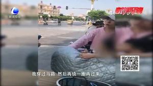 女子騎電動(dòng)車(chē)帶孩子逆行 竟怒懟交警